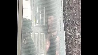 Watching my neighbor masturbate